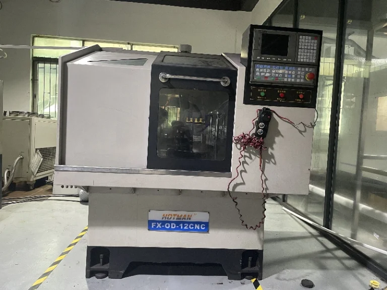 Precision grinding machine finishing drill point geometry